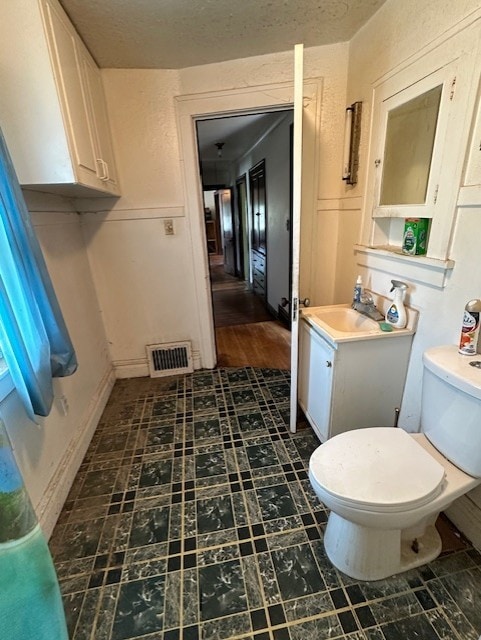 301 S Hebbard St, Joliet, IL 60433 - bathroom featuring toilet and vanity