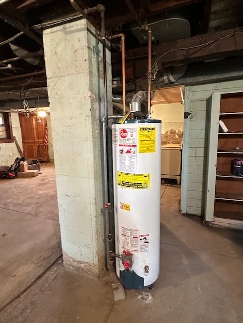 301 S Hebbard St, Joliet, IL 60433 - utility room featuring gas water heater