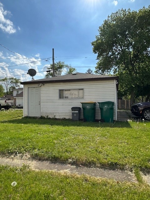 301 S Hebbard St, Joliet, IL 60433 - rear view of house with a lawn