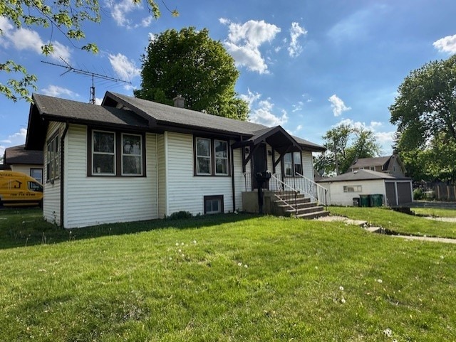 301 S Hebbard St, Joliet, IL 60433 - view of front facade featuring a front yard
