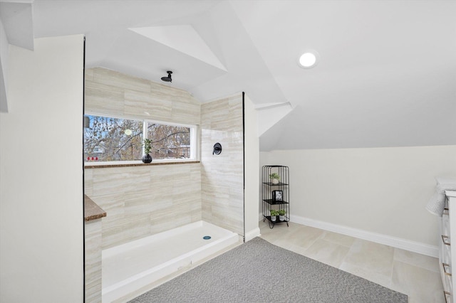 8214 S Paxton Ave, Chicago, IL 60617 - full bath with lofted ceiling, a tile shower, and baseboards