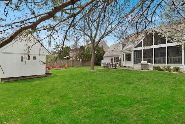 519 Long Hill Rd, Gurnee, IL 60031 - view of yard featuring a sunroom and a patio area