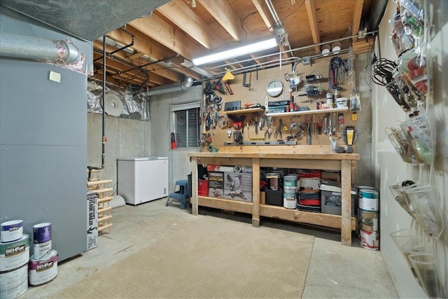 519 Long Hill Rd, Gurnee, IL 60031 - unfinished below grade area with refrigerator and a workshop area