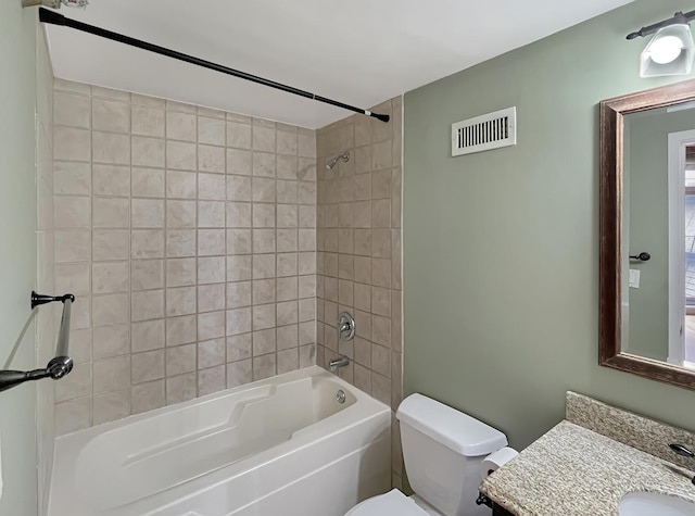 full bathroom with toilet, washtub / shower combination, and vanity