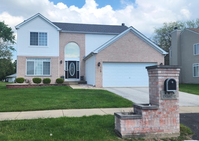 traditional home featuring brick siding, a garage, concrete driveway, and a front yard