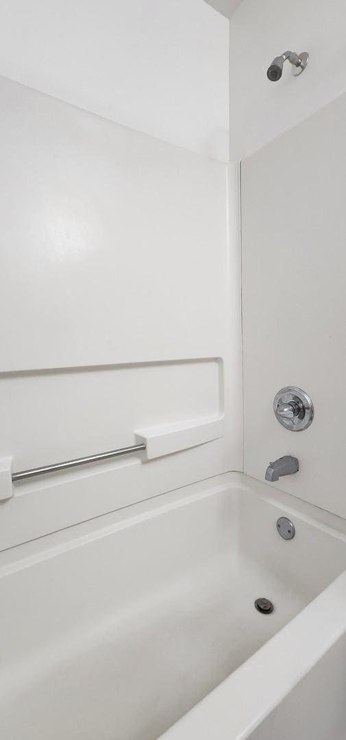bathroom featuring bathtub / shower combination