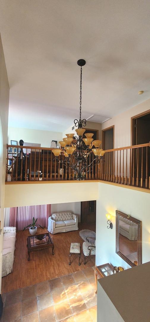 interior space featuring a chandelier