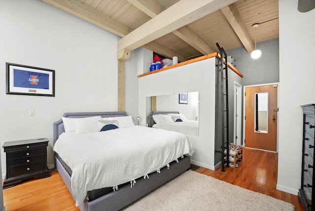 2435 N Sheffield Ave Unit 10, Chicago, IL 60614 - bedroom with wood ceiling, wood finished floors, baseboards, and a barn door
