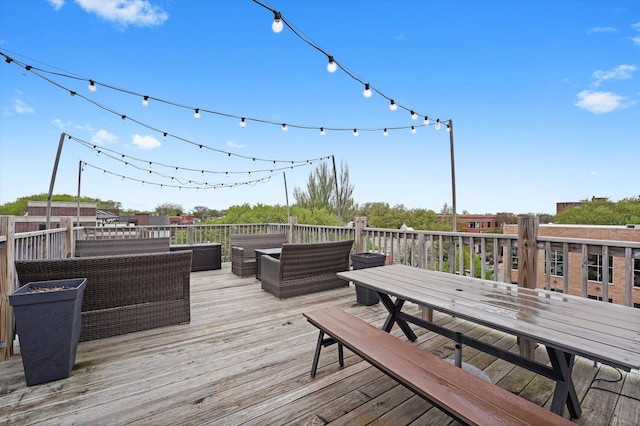2435 N Sheffield Ave Unit 10, Chicago, IL 60614 - deck with an outdoor hangout area and outdoor dining area