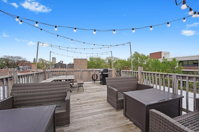 2435 N Sheffield Ave Unit 10, Chicago, IL 60614 - deck featuring a grill and an outdoor living space
