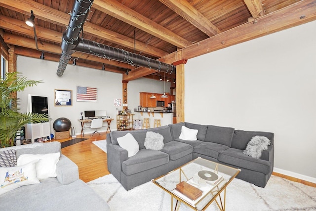 2435 N Sheffield Ave Unit 10, Chicago, IL 60614 - living area with beam ceiling, wooden ceiling, wood finished floors, baseboards, and an office area