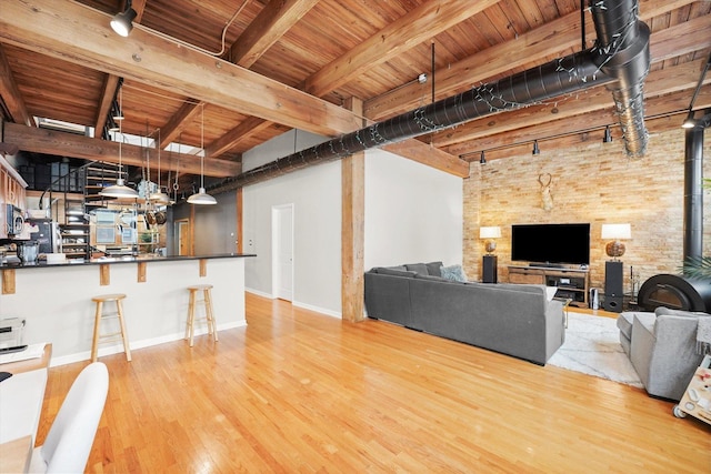 2435 N Sheffield Ave Unit 10, Chicago, IL 60614 - living room with wooden ceiling, wood finished floors, beam ceiling, baseboards, and track lighting