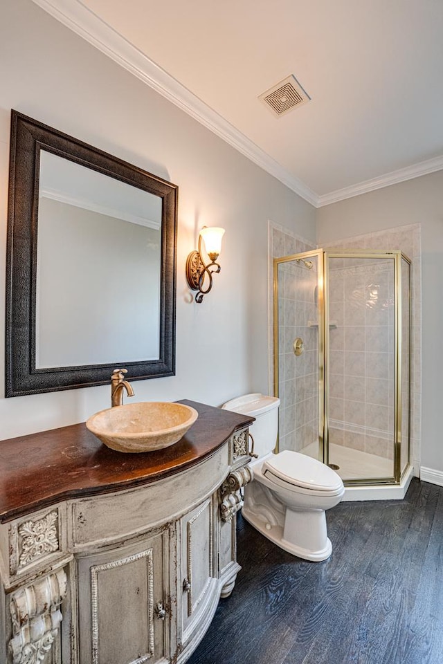 1565 Winberie Ct, Naperville, IL 60564 - bathroom featuring toilet, wood finished floors, vanity, ornamental molding, and a shower stall