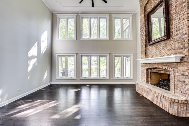 1565 Winberie Ct, Naperville, IL 60564 - unfurnished living room with a ceiling fan, plenty of natural light, ornamental molding, baseboards, and wood finished floors
