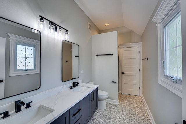 1565 Winberie Ct, Naperville, IL 60564 - full bath with double vanity, toilet, baseboards, tile patterned floors, and vaulted ceiling