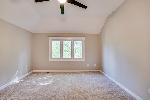 1565 Winberie Ct, Naperville, IL 60564 - empty room featuring ceiling fan, carpet, lofted ceiling, and baseboards