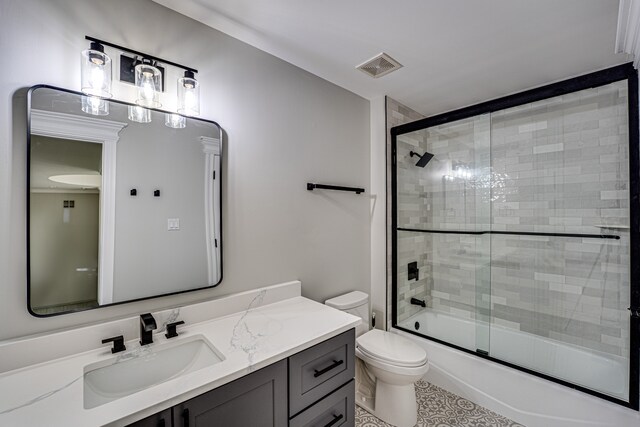 1565 Winberie Ct, Naperville, IL 60564 - bathroom with vanity, toilet, and bath / shower combo with glass door