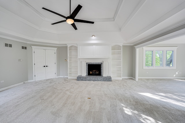 1565 Winberie Ct, Naperville, IL 60564 - unfurnished living room with a tray ceiling, carpet, a ceiling fan, ornamental molding, and a high end fireplace