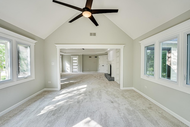 1565 Winberie Ct, Naperville, IL 60564 - unfurnished living room with healthy amount of natural light, carpet, and vaulted ceiling