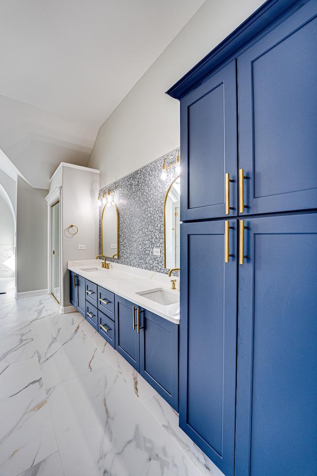 1565 Winberie Ct, Naperville, IL 60564 - bathroom with lofted ceiling, double vanity, and marble look tile flooring