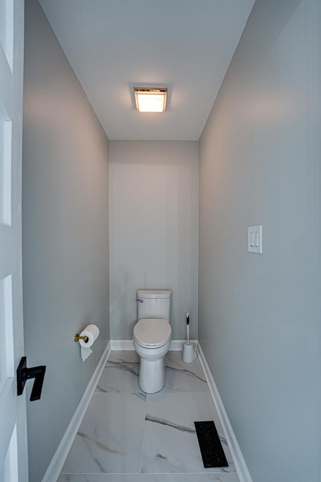 1565 Winberie Ct, Naperville, IL 60564 - bathroom featuring toilet, marble finish floors, and baseboards