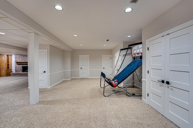 1565 Winberie Ct, Naperville, IL 60564 - exercise room with a fireplace, carpet flooring, recessed lighting, and baseboards