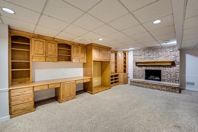 1565 Winberie Ct, Naperville, IL 60564 - unfurnished office with built in desk, light colored carpet, a fireplace, recessed lighting, and a paneled ceiling