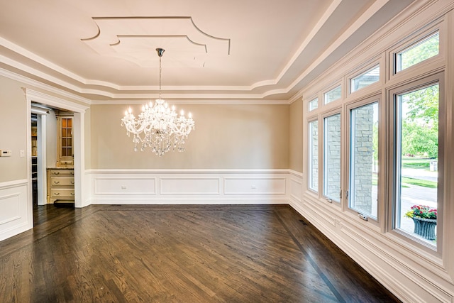 1565 Winberie Ct, Naperville, IL 60564 - empty room featuring a raised ceiling, healthy amount of natural light, a chandelier, wainscoting, and a decorative wall