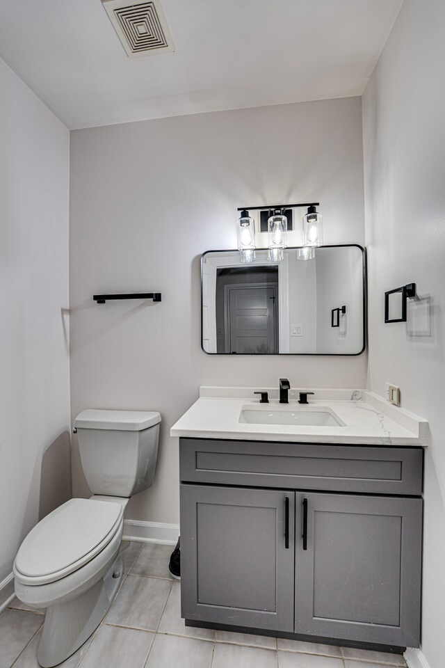 1565 Winberie Ct, Naperville, IL 60564 - half bath with toilet, vanity, baseboards, and tile patterned flooring