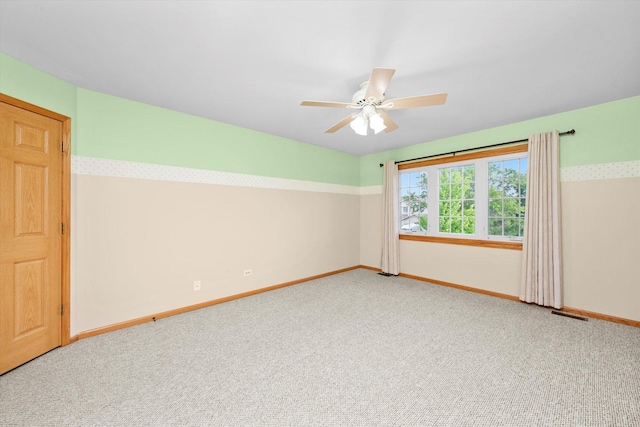 11046 Quail Dr, Mokena, IL 60448 - carpeted spare room featuring baseboards and a ceiling fan