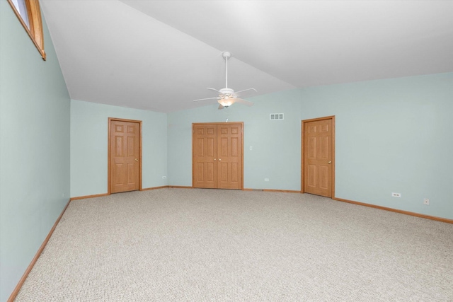 11046 Quail Dr, Mokena, IL 60448 - unfurnished living room with carpet floors, a ceiling fan, baseboards, and lofted ceiling