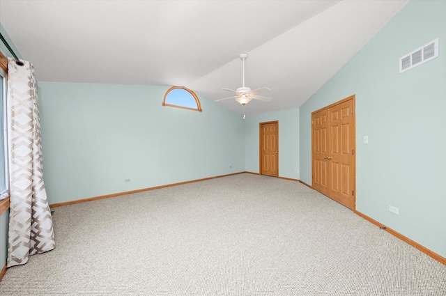 11046 Quail Dr, Mokena, IL 60448 - unfurnished bedroom featuring lofted ceiling, carpet, baseboards, and ceiling fan