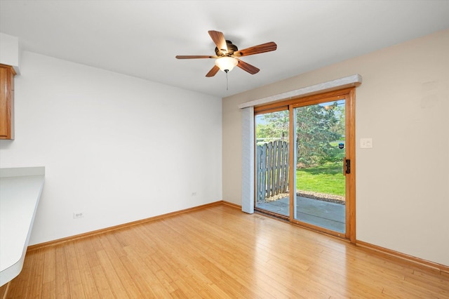 11046 Quail Dr, Mokena, IL 60448 - spare room with light wood-style flooring, ceiling fan, and baseboards