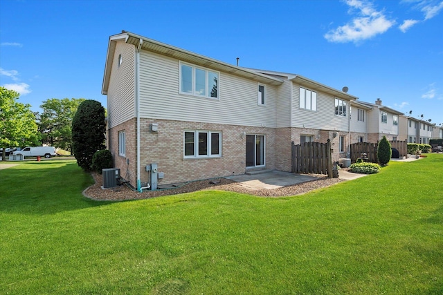 11046 Quail Dr, Mokena, IL 60448 - rear view of house featuring brick siding, cooling unit, and a patio