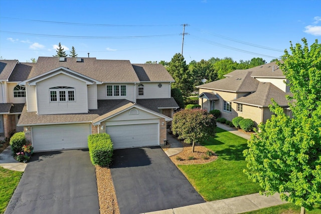 11046 Quail Dr, Mokena, IL 60448 - view of front facade featuring asphalt driveway, a front yard, brick siding, an attached garage, and a shingled roof