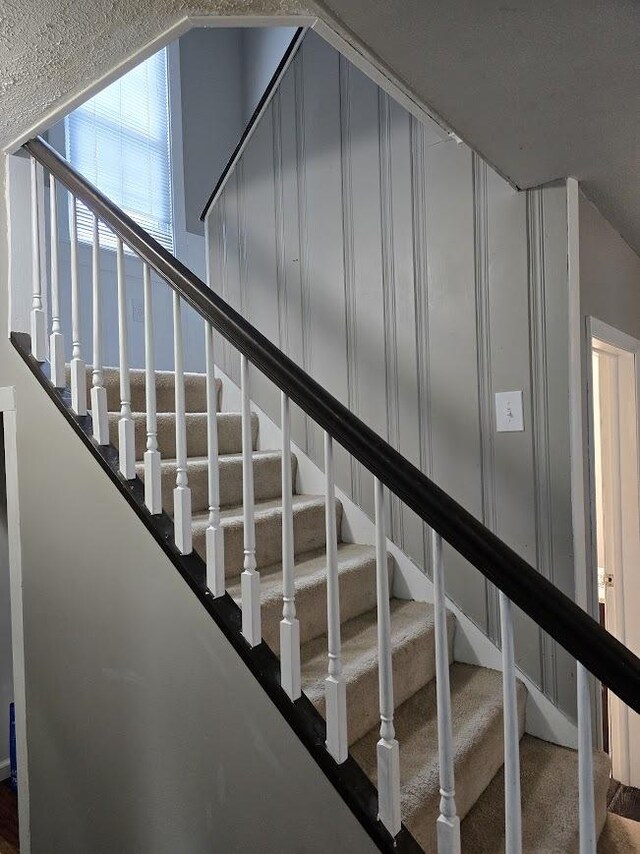 320 N Pearl St, Forrest, IL 61741 - stairs with carpet floors
