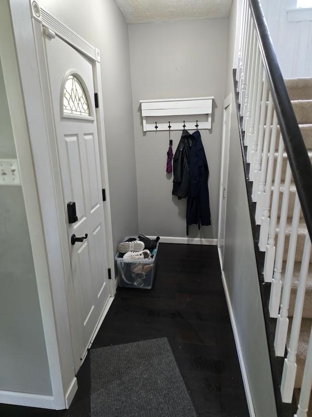 320 N Pearl St, Forrest, IL 61741 - mudroom with baseboards and wood finished floors