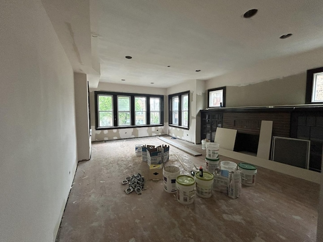 unfurnished living room with a fireplace