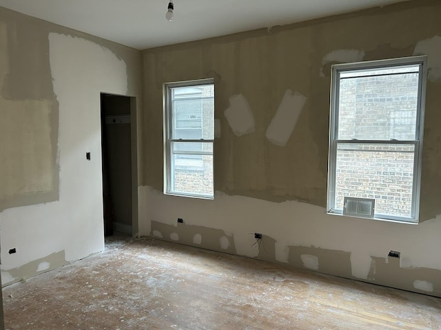 empty room featuring healthy amount of natural light