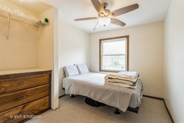 898 Shorewood Dr, Bartlett, IL 60103 - bedroom with light carpet, baseboards, and ceiling fan