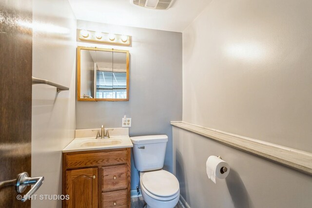898 Shorewood Dr, Bartlett, IL 60103 - half bath featuring vanity and toilet