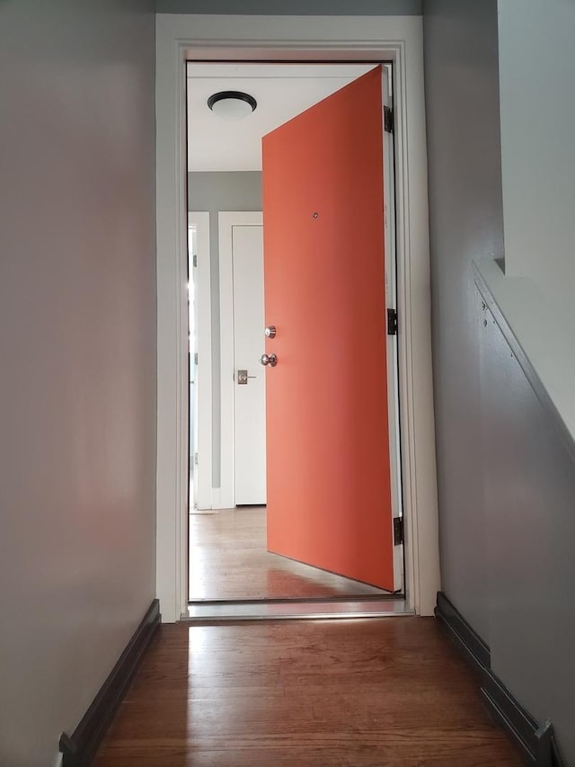 hallway featuring wood finished floors