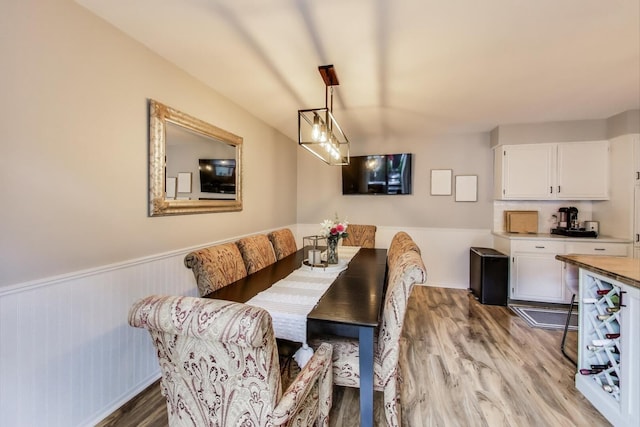 405 W Ivy Ln Unit 4A, Arlington Heights, IL 60004 - dining room with wood finished floors and wainscoting