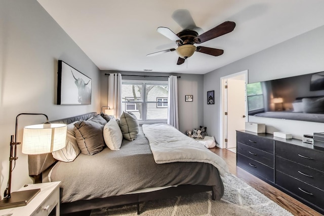 405 W Ivy Ln Unit 4A, Arlington Heights, IL 60004 - bedroom with wood finished floors and a ceiling fan