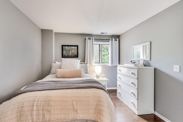 405 W Ivy Ln Unit 4A, Arlington Heights, IL 60004 - bedroom with wood finished floors and baseboards