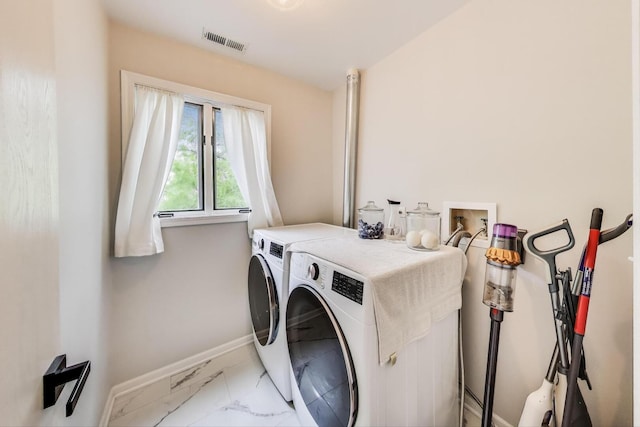 405 W Ivy Ln Unit 4A, Arlington Heights, IL 60004 - laundry room featuring independent washer and dryer, marble finish flooring, and baseboards