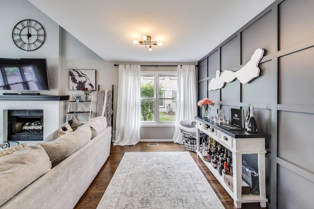 405 W Ivy Ln Unit 4A, Arlington Heights, IL 60004 - living area featuring baseboards and a fireplace