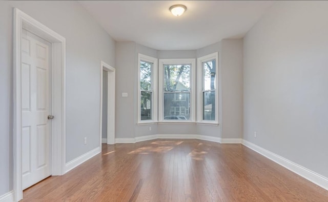 4240 S Campbell Ave, Chicago, IL 60632 - empty room with wood finished floors and baseboards