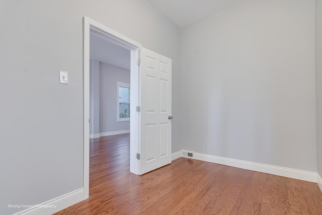 4240 S Campbell Ave, Chicago, IL 60632 - spare room with baseboards and wood finished floors