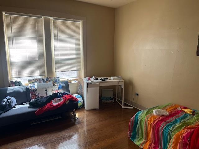 1428 S St Louis Ave, Chicago, IL 60623 - bedroom featuring wood finished floors